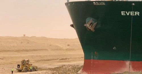 Captain of huge 224,000 tonne megaship stuck in Suez Canal blames 'strong winds'