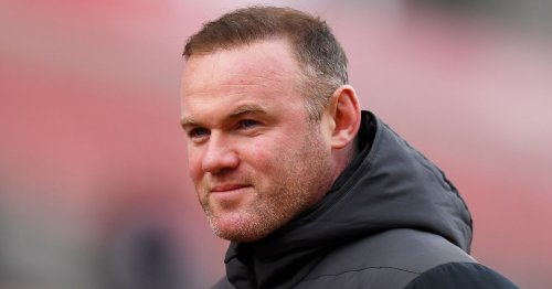 Police called over photos of Wayne Rooney 'asleep' next to scantily clad woman