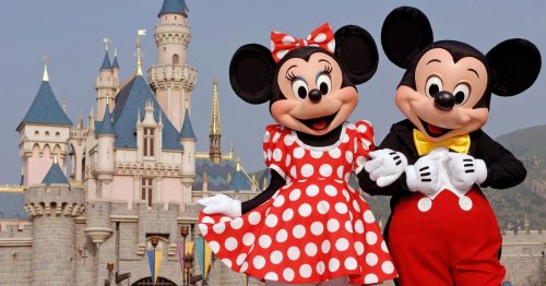 Minnie Mouse ditches famous red polka dot dress in favour of blue power suit