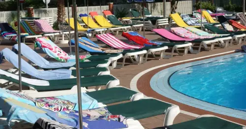 Cruise line looks to end sunbed wars with strict new rules for 'chair hogs'
