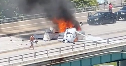 Air traffic controller killed after plane smashes into BRIDGE and bursts into flames