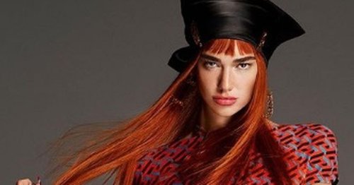 Dua Lipa 'unrecognisable' as she dyes hair fiery red for Versace campaign