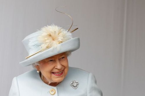 Queen's cheeky four-word response to photographer who asked her to smile for him