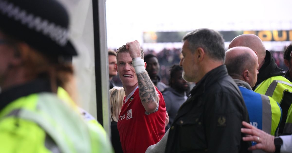 Wrexham star James McClean targeted by angry fan as police intervene during controversial clash
