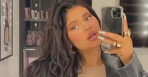 Kylie Jenner rocks stomach-baring crop top to show off blossoming baby bump