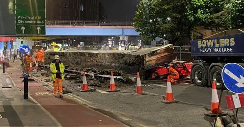 Huge 120-tonne bridge collapses from crane crushing truck on street