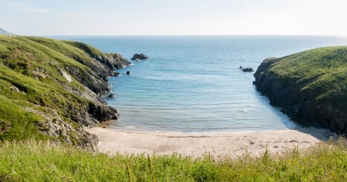 'Secret' UK beach with crystal-clear water is perfect spot for fully-sheltered swimming