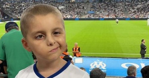 Football fans attack eight-year-old with brain cancer and burn his shirt in shameful scenes