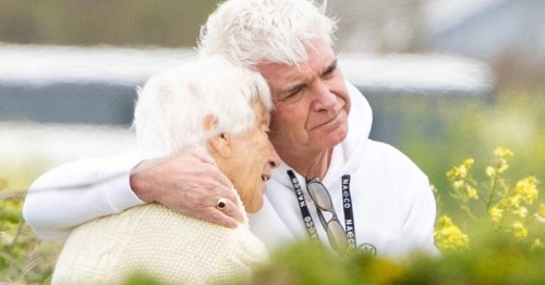 Devastated Phillip Schofield pictured comforting his mum as he reveals This Morning axe