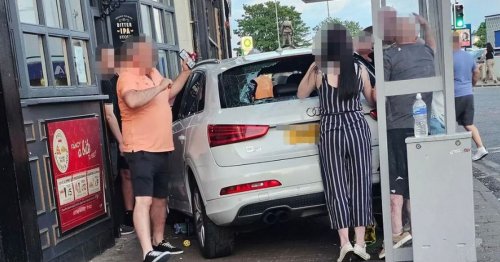 Car ploughs into pedestrian outside bar as police launch probe into 'hit and run'