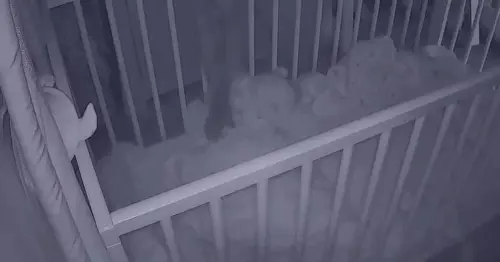Horrified dad watches eerie 'ghost arm' reach into son's cot on baby monitor