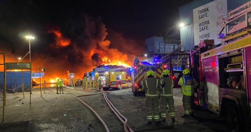 100 firefighters battle huge blaze at metal plant as flames engulf building