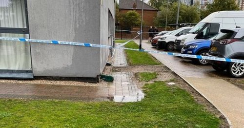 Toddler, 2, found injured outside high-rise block of flats as police surround building