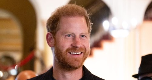 Prince Harry beams as he breaks cover after US visa documents are unsealed in drugs row