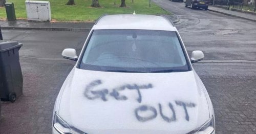 Heavily pregnant woman forced out in hate crime as 'GET OUT' sprayed on car