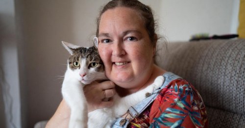 Cat mum's life saved after pet pounded its paws on her chest during heart attack