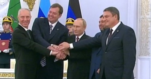 Tiny Vladimir Putin in bizarre 4-way handshake ritual after months avoiding human contact