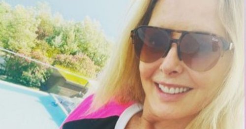 Carol Vorderman, 61, wows fans with toned abs as she goes for a dip in cropped swimwear