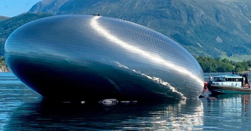 Strange UFO-shaped building appears on Norwegian lake leaving locals baffled