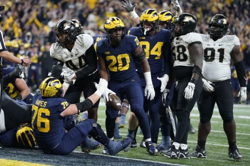 In Michigan’s most important games, an unlikely running back emerges