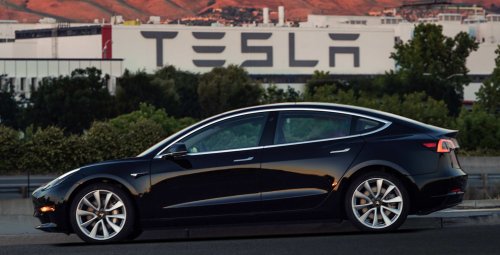 Elon Musk reveals first production Tesla Model 3