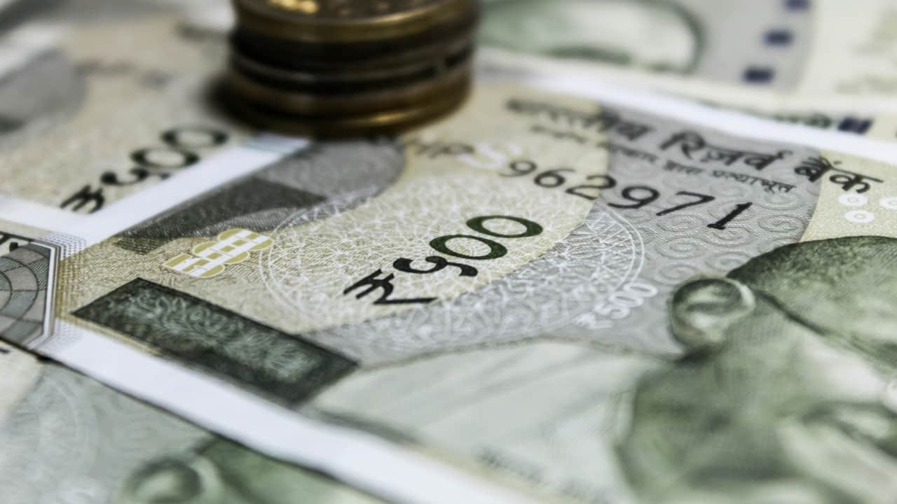 Rupee weakens to record low on US trade deal limbo, persistent outflows