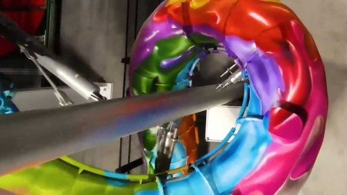 Tesla's paint shop in Germany has an unbelievable tube slide