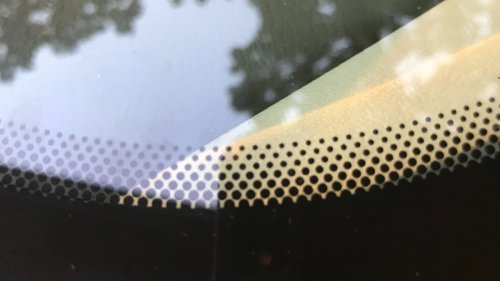 Why Does a Car Windshield Have Small Black Dots?