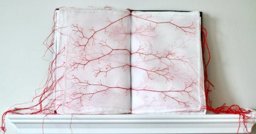 Fabric Books Artistically Embellished With Vein-Like Tendrils of Red Thread