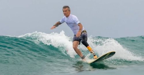 55-Year-Old Surfer With Prosthetic Leg Conquers Massive Waves Around the World
