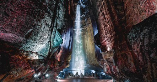 Travel Down to the Tallest Underground Cave Waterfall in a High-Speed Glass Elevator