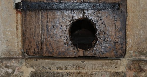 The World’s Oldest Cat Door Has Been Letting Working Cats Enter the Cathedral Since the 14th Century