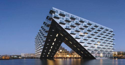Architects Design Building With Apartments Floating Over Water Like the Bow of a Ship