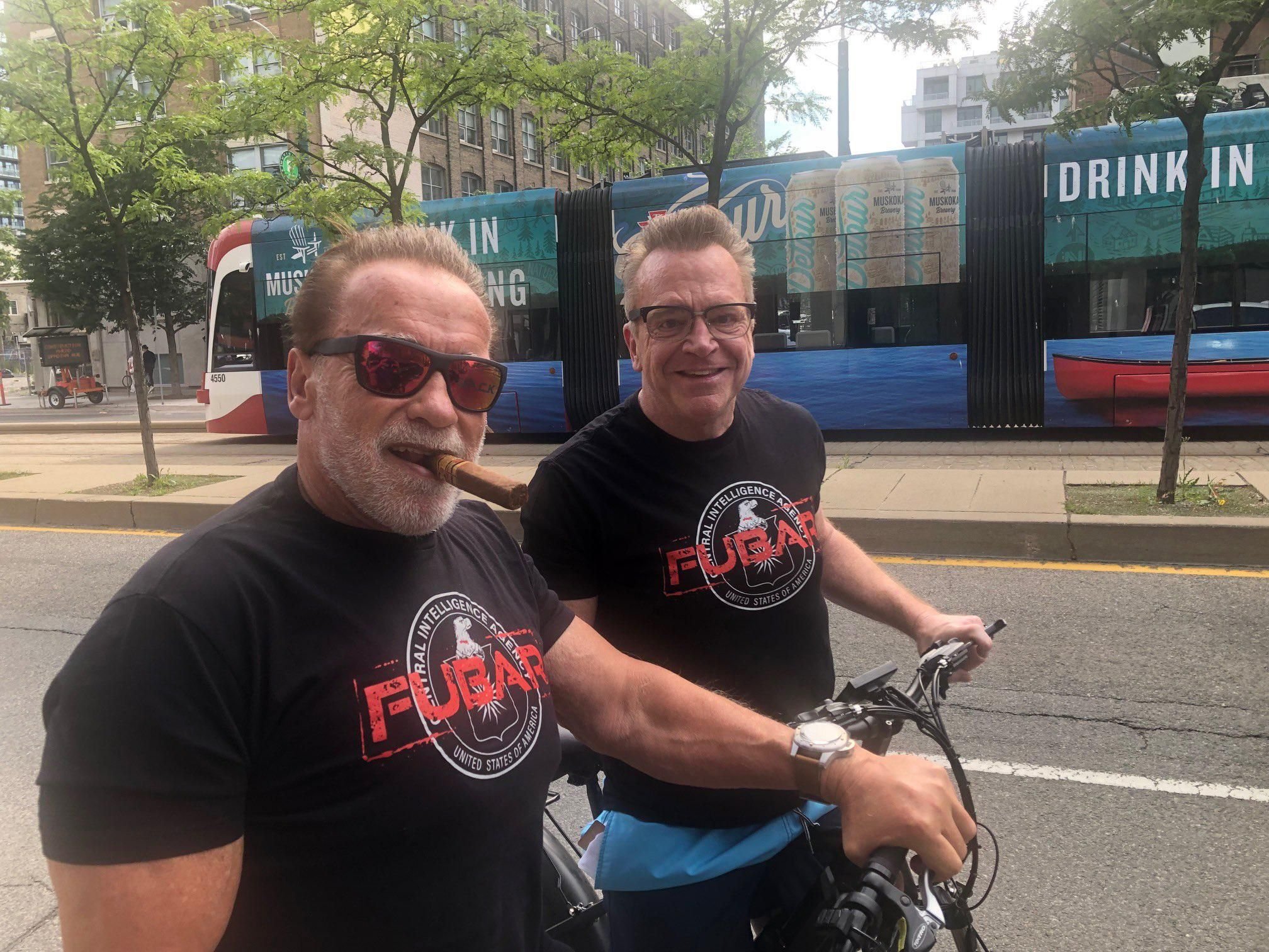 Arnold Schwarzenegger Was Spotted Biking In Toronto With His Old Co-Star Tom Arnold