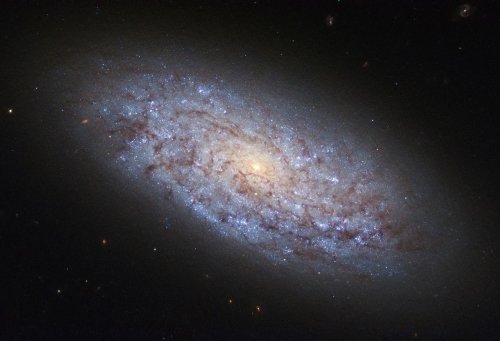 Hubble Captures Image of Galaxy Moving Away at 3 Million Miles Per Hour