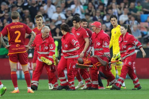 Match abandoned as top flight international footballer collapses on field