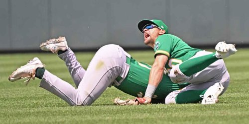 Pinder in another scary collision during A's-Royals game