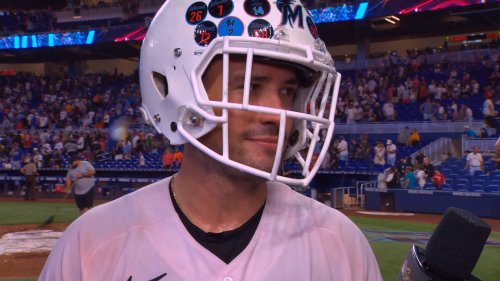 Marlins' Nick Fortes does interview in football helmet after walk-off