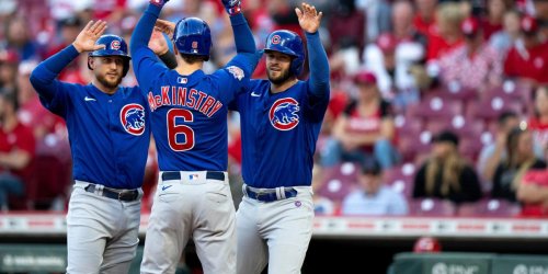 Cubs end season on high note, beat Reds 15-2