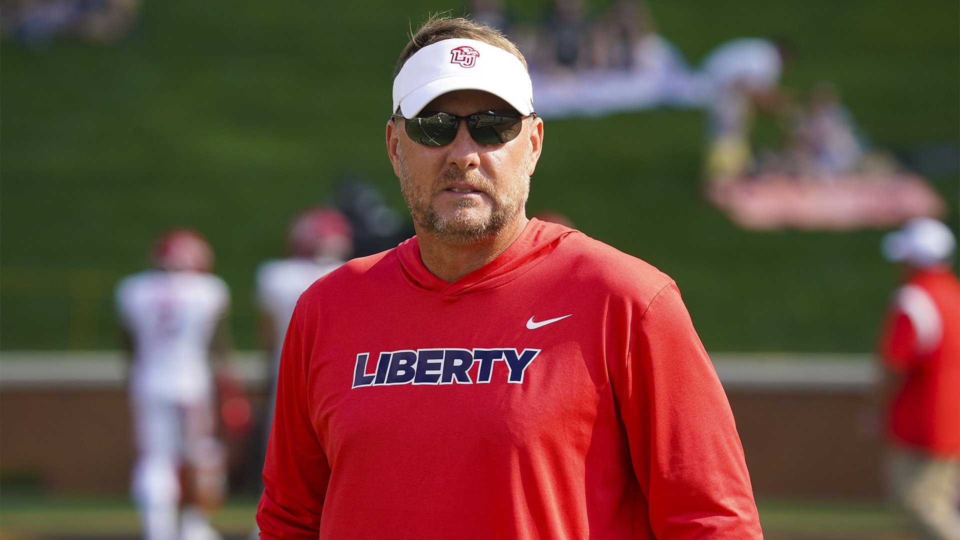 Auburn hires Liberty’s Hugh Freeze, who’s coming back to SEC