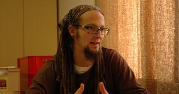 'Our love doesn't stop at our borders,' Shane Claiborne tells John Dear