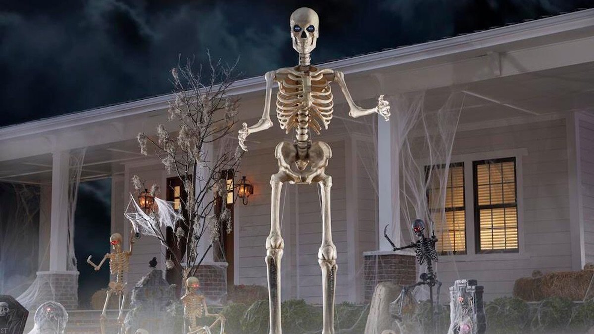 12-Foot Skeleton Looms Over Other Halloween Decorations