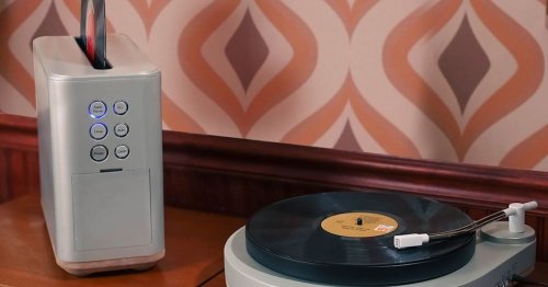 Ultrasonic bath cleans records before playback on matching turntable