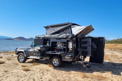 Toyota Land Cruiser micro RV deploys into loaded off-grid base camp