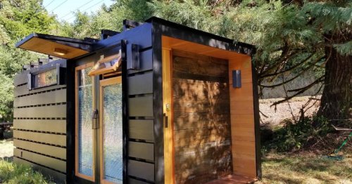 Shipping container turned into compact tiny house for two