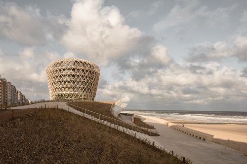 Climate-resilient tower rises out of an artificial dune