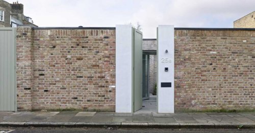 Ordinary looking garden wall conceals two-bedroom courtyard home