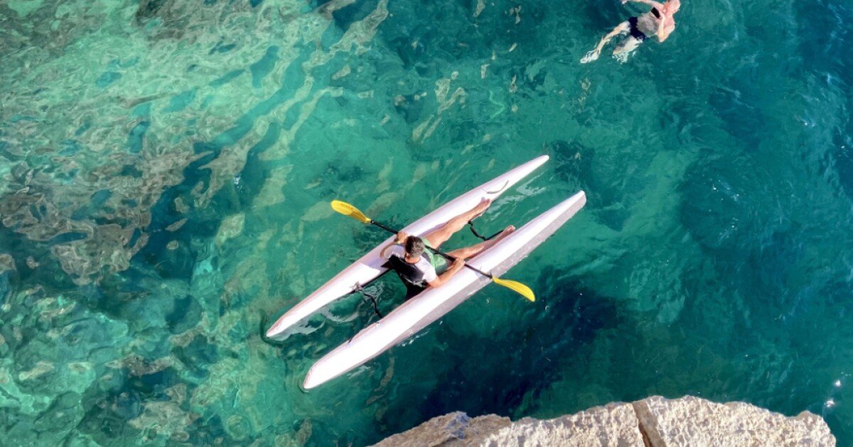 Inflatable Super Kayak catamaran packs into a bag for transport