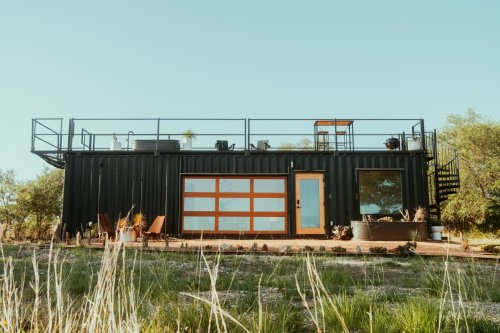 Luxury shipping container-based house boasts rooftop deck with hot tub