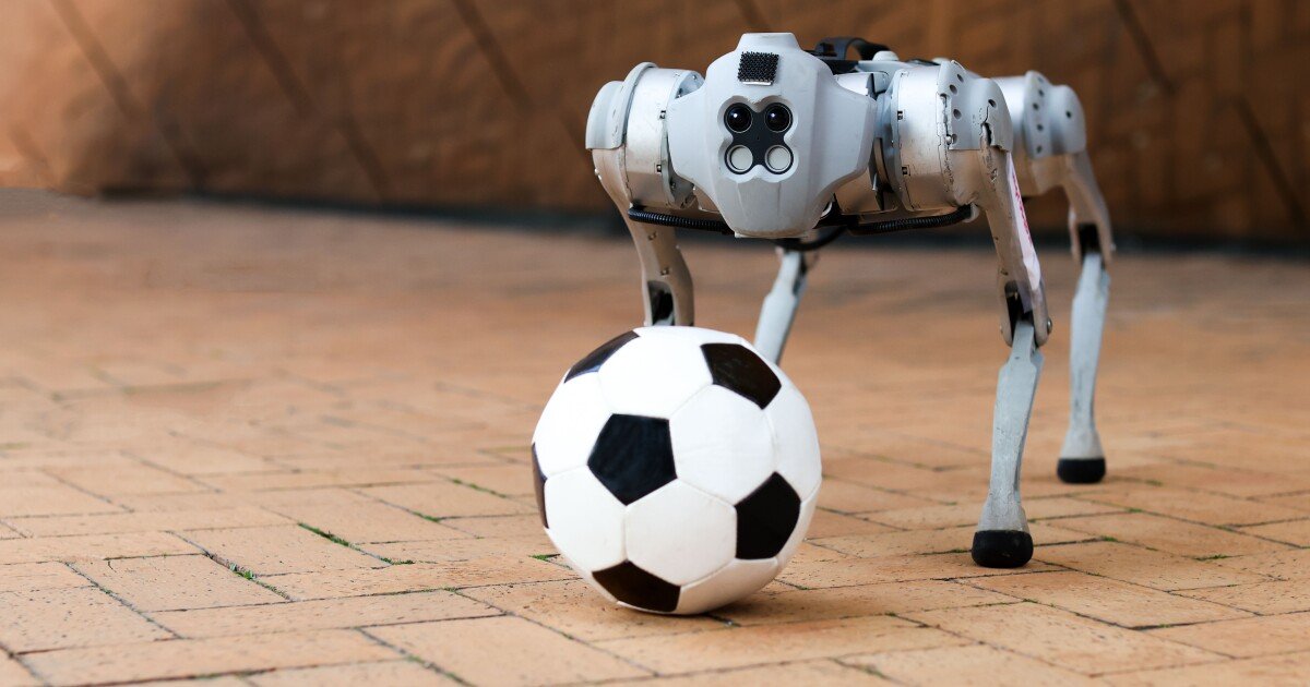 DribbleBot learns to dribble a soccer ball under realistic conditions
